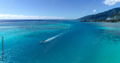 boats in a lagoon in French Polynesia, in aerial view