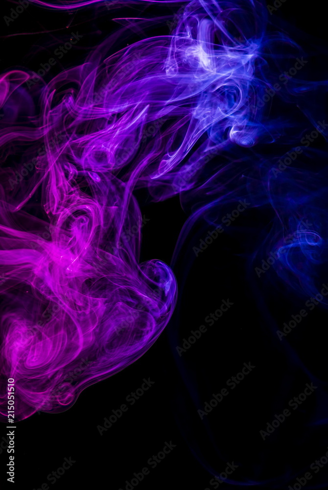 Colored smoke on black background Colored smoke on black background