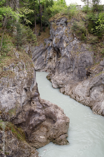 The river on the Leh river flows among the high rocks of füssen, Bavaria, Germany photo