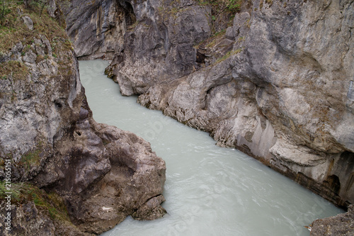 The river on the Leh river flows among the high rocks of füssen, Bavaria, Germany photo