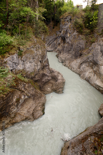 The river on the Leh river flows among the high rocks of füssen, Bavaria, Germany photo