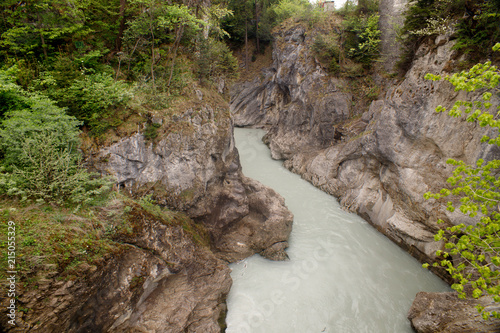 The river on the Leh river flows among the high rocks of füssen, Bavaria, Germany photo
