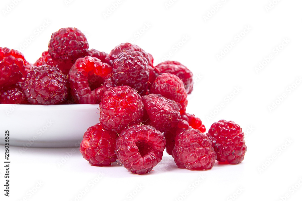 Harvested juicy ripe raspberries fruit on white background.. Harvested juicy ripe raspberries fruit on white background..