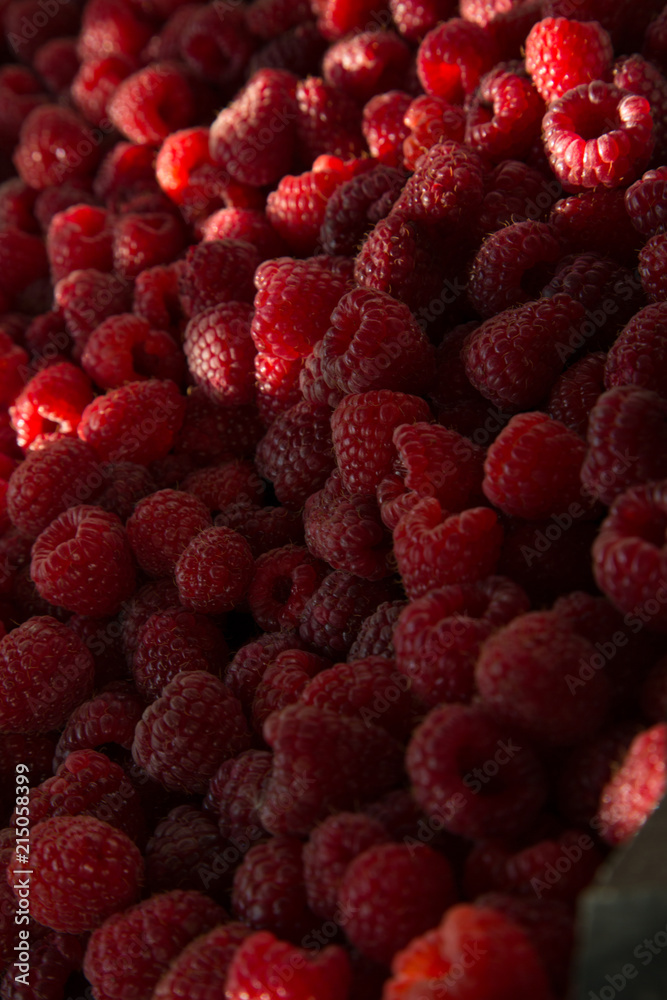 Red raspberries close-up / Heap of fresh ripe red raspberries Red raspberries close-up / Heap of fresh ripe red raspberries