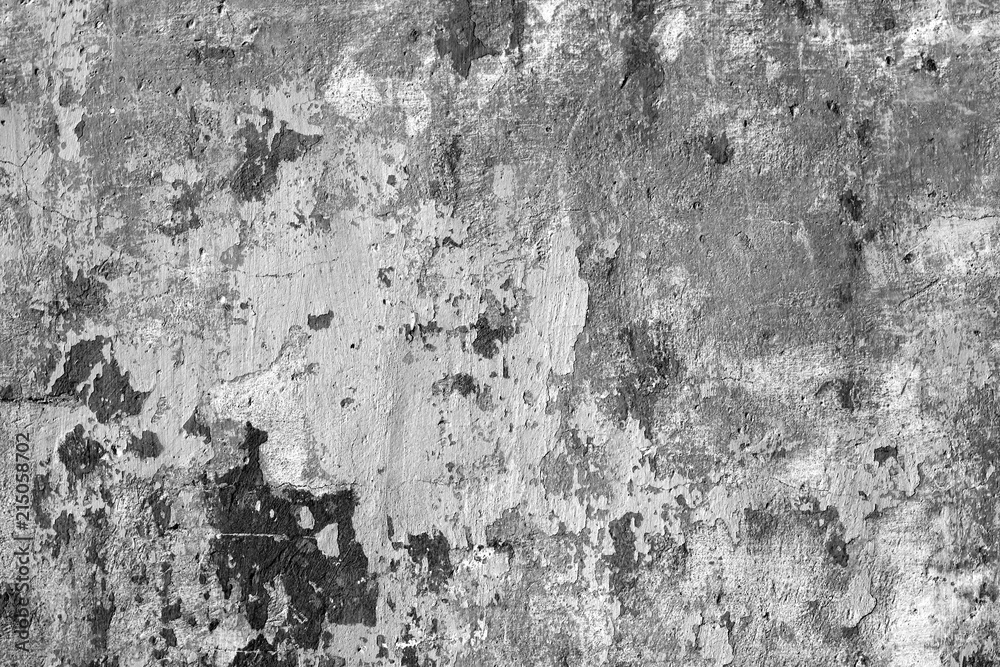 Grungy cement wall in black and white.