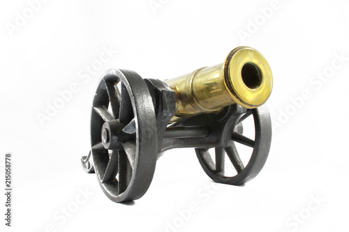 Antique Brass Canon on Wheels on White background 