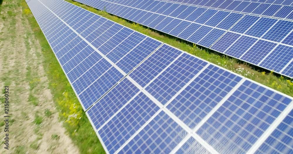 Aerial shot: Flight over solar panels, Alternative energie Aerial shot: Flight over solar panels, Alternative energie
