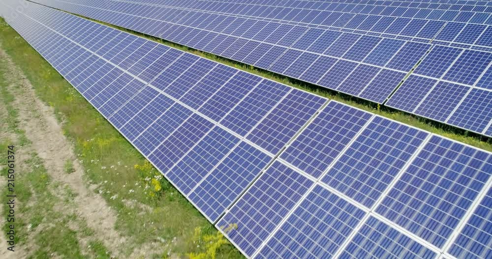Aerial shot: Flight over solar panels, Alternative energie Aerial shot: Flight over solar panels, Alternative energie