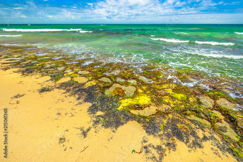 Landscape of Mettams Pool a limestone bay safe for snorkelling place. Trigg Beach in North Beach near Perth, Western Australia. Mettam's is a natural rock pool protected by a surrounding coral reef. photo