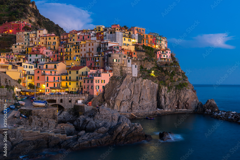 Blue hour in Manarola, one of colorful villages of Cinque Terre, Italy