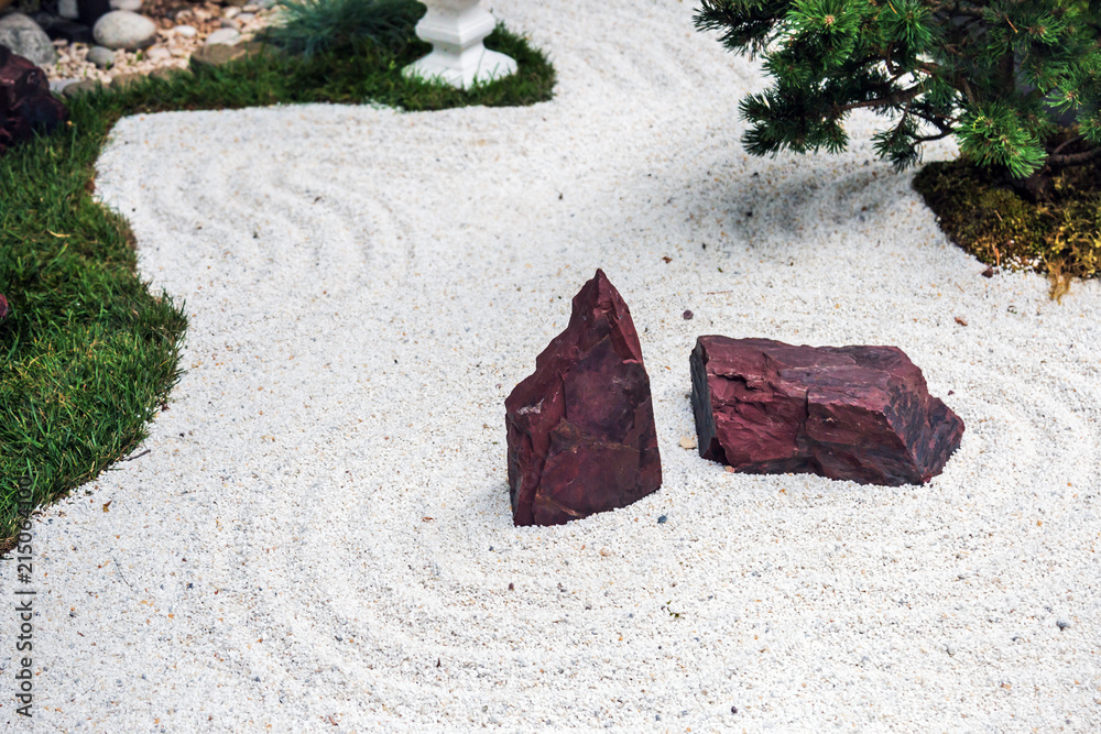 decorations with sand and stones in the Japanese garden. Garden decorations decorations with sand and stones in the Japanese garden. Garden decorations