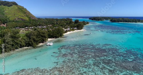 boat on a lagoon with pontoon in French Polynesia