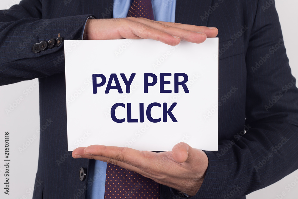 Man showing paper with PAY PER CLICK text Man showing paper with PAY PER CLICK text