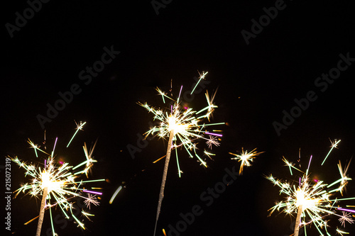 Group of sparklers isolated. Christmas Eve decoration.