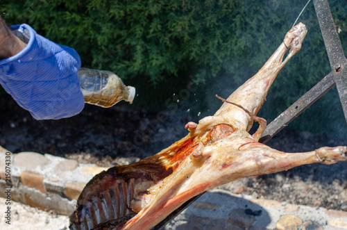 Lamb roasting in a barbecue