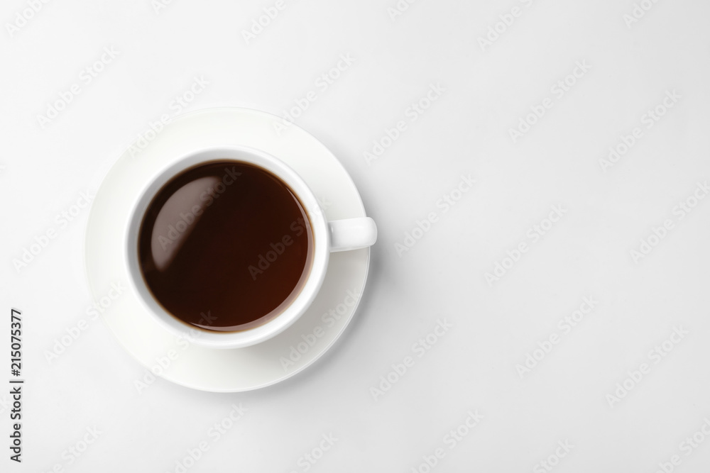 Ceramic cup with hot aromatic coffee on white background Ceramic cup with hot aromatic coffee on white background