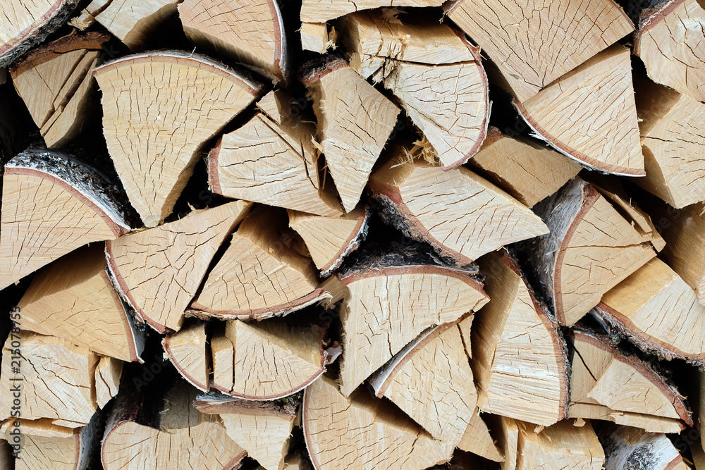texture of birch chopped firewood, a large amount of firewood texture of birch chopped firewood, a large amount of firewood
