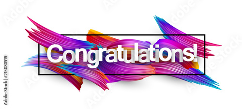 Congratulations paper banner with colorful brush strokes.