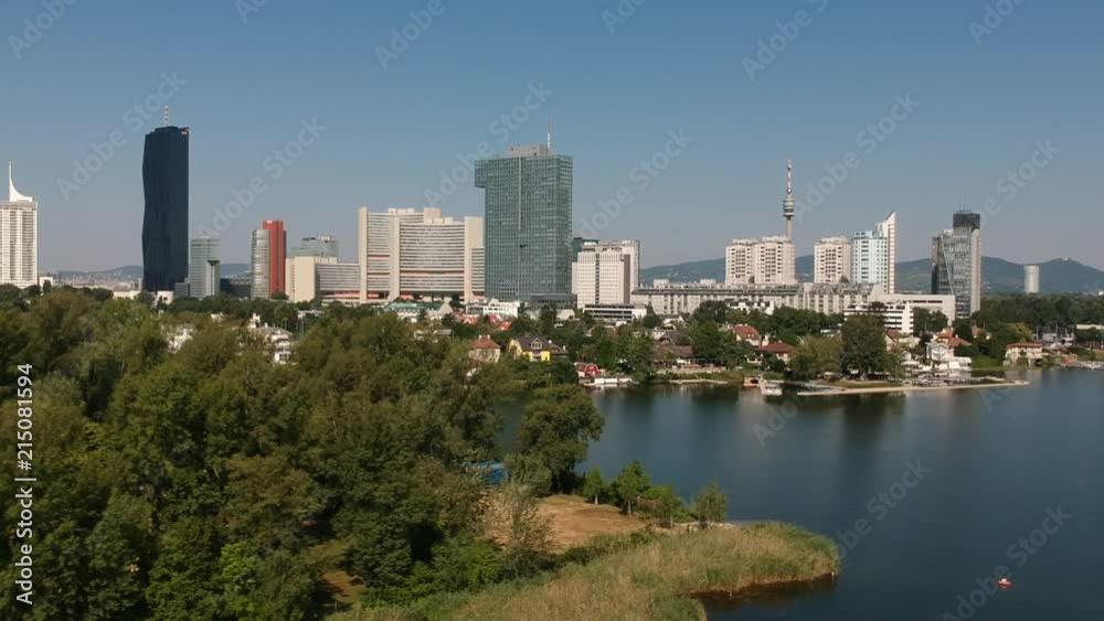 Drone flight over Alte Donau viewing Donaucity in Vienna, Austria Drone flight over Alte Donau viewing Donaucity in Vienna, Austria