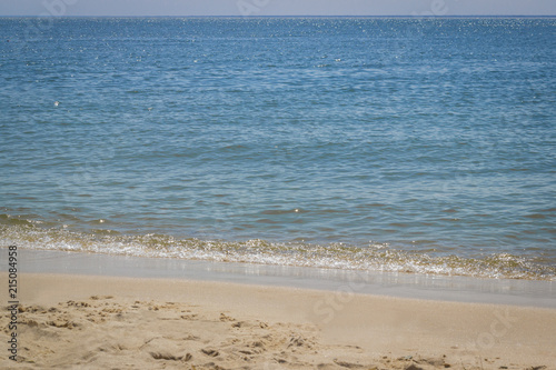 seacoast with the sand in the sunlight