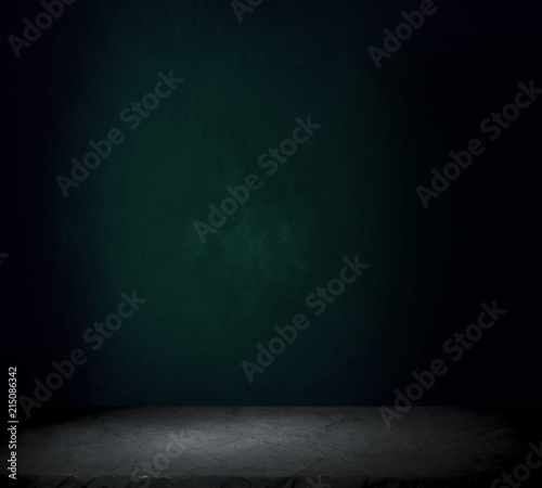Dark room with tile floor and brick wall background