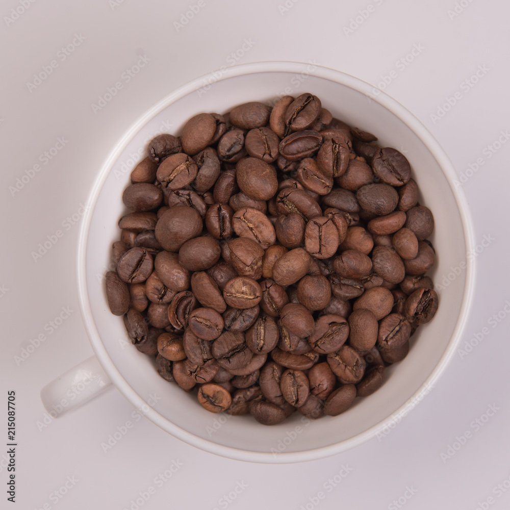 Coffee seeds on a colored background Coffee seeds on a colored background