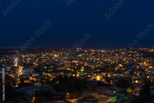 Night view of Silifke town with blue sky and clouds from hill of silifke castle © epic_images
