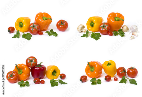Fototapeta Naklejka Na Ścianę i Meble -  Red yellow and orange peppers with tomatoes on a white background..Multicolored vegetables in a composition on a white background..