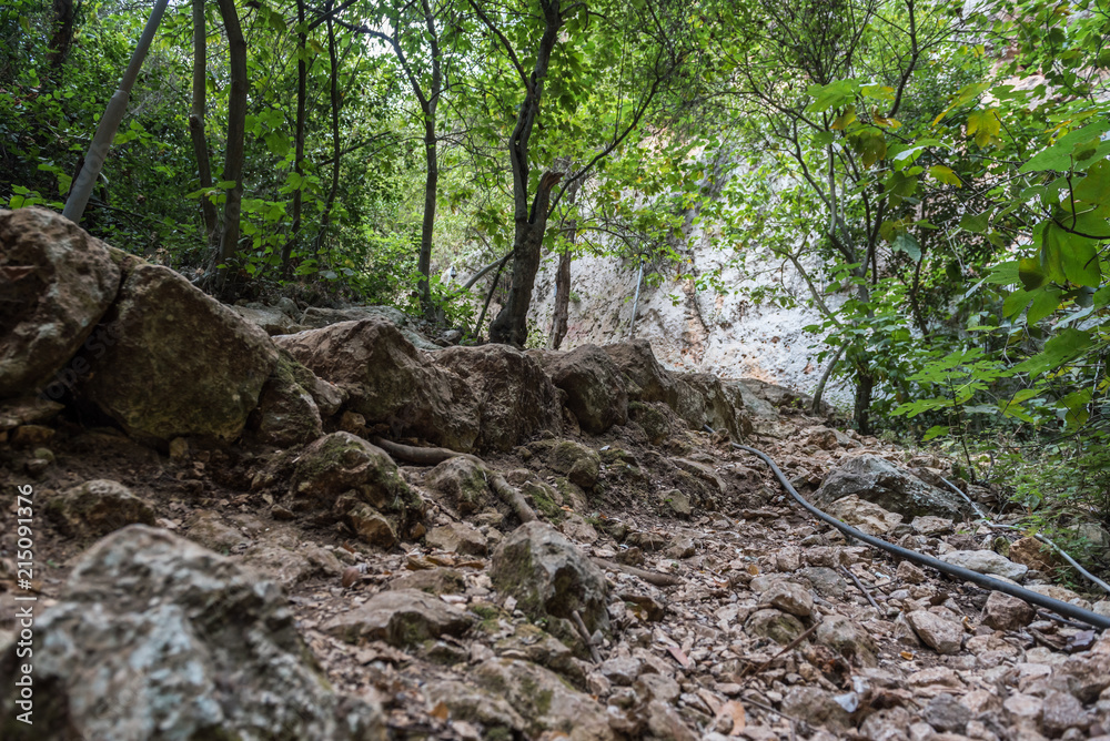Stone slippery stairs towards cave of Chasm of Heaven in Silifke district, Mersin Turkey Stone slippery stairs towards cave of Chasm of Heaven in Silifke district, Mersin Turkey