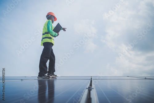 engineer working on maintenance panel in solar power plant