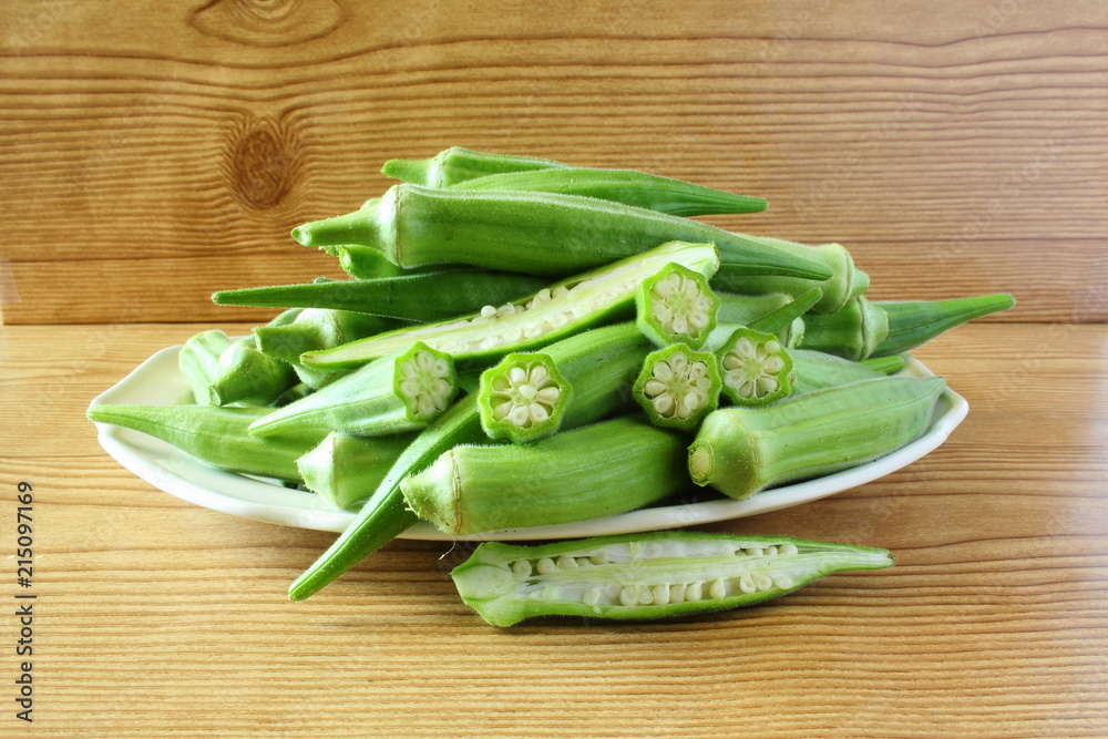 fresh okra vegetable in wooden table background fresh okra vegetable in wooden table background