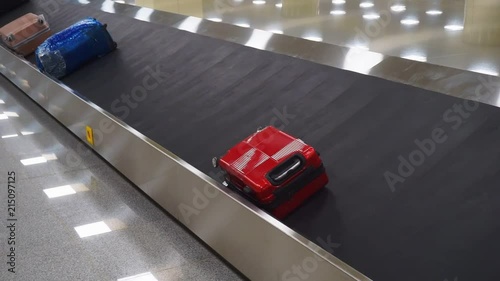 arriving baggage travels on the conveyor at the airport. 