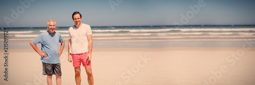 Portrait of man with father standing at beach © vectorfusionart
