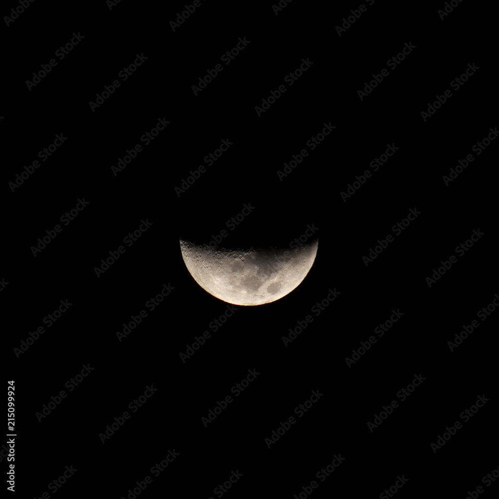 Mystical Waxing Crescent half Moon close up on Dark night sky Black background shot at 300mm Focal Lenght Lens Mystical Waxing Crescent half Moon close up on Dark night sky Black background shot at 300mm Focal Lenght Lens