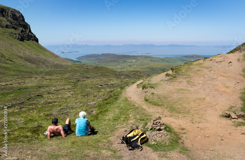 Old Couple Enjoying the View of  Quiraing Trail in Summer Skye Scotland UK