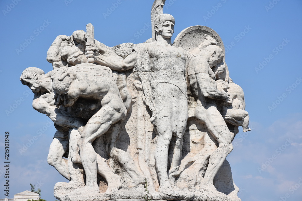 Rome,  marble group on the Vittorio Emanuele II bridge over the Tiber river.