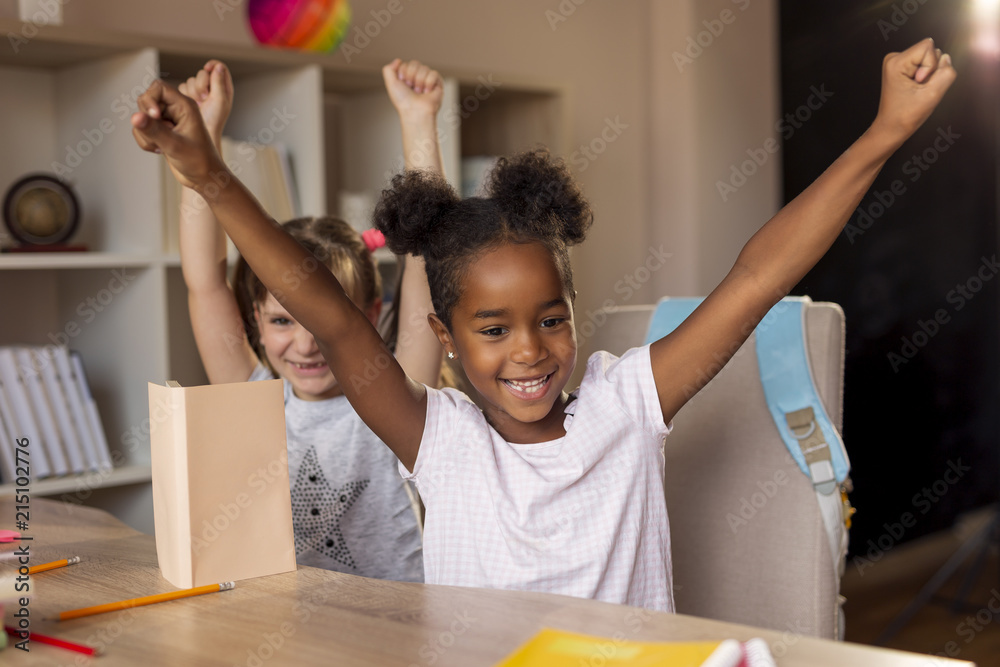 Fototapeta premium Girls finished homework celebrating