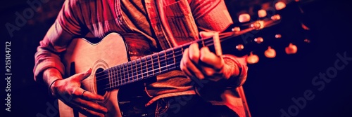 Young man playing guitar 