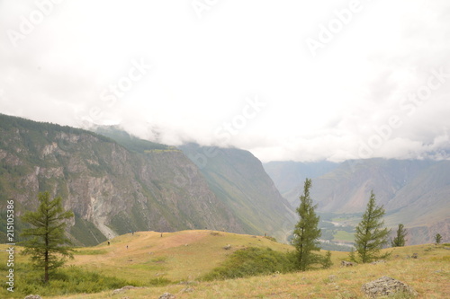 nature landscape landscape mountains valley hills rocks cave water waterfall stream river stream rock stone sky grass trees green blue white tourism excursions Russia 