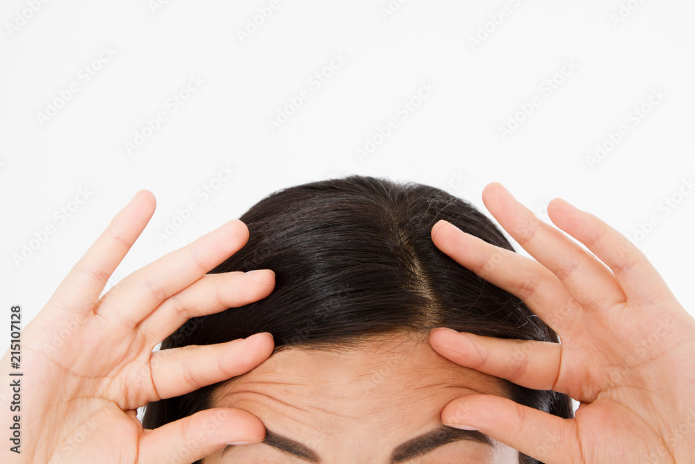 Macro Asian Woman face with wrinkles on the forehead. Collagen and face injections concept. Cropped image. Copy space and mock up. Macro Asian Woman face with wrinkles on the forehead. Collagen and face injections concept. Cropped image. Copy space and mock up.