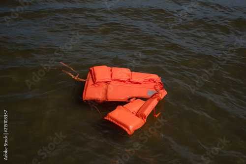 Floating life jacket in sea water.