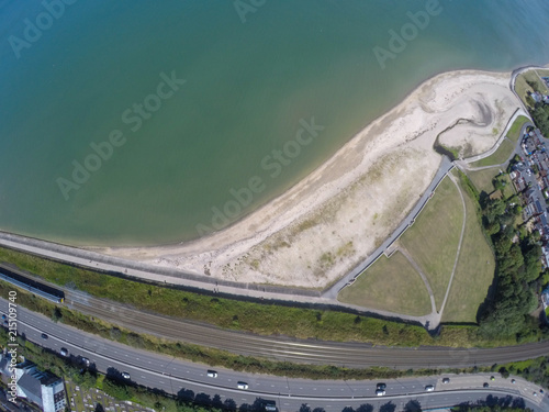 aerial view on beach, coast of sea and road from above in holywood northern ireland photo