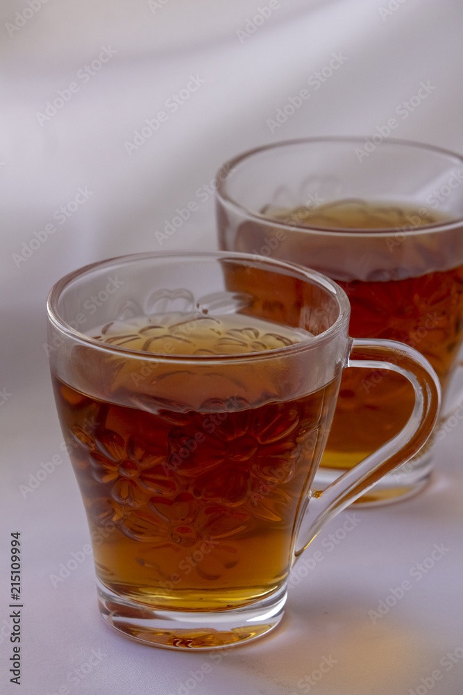 Two cups of tea isolated on white Two cups of tea isolated on white