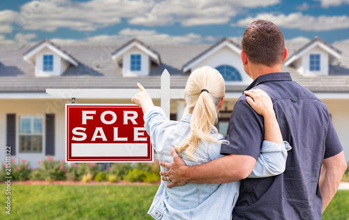 Young Adult Couple Facing a...