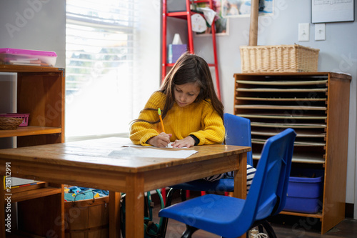 Students  in a classroom at a Montessori school.