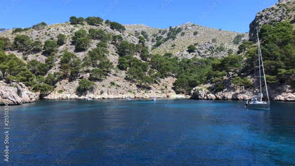 People enjoying summer sailing on boat or spending a sunny day on the beach People enjoying summer sailing on boat or spending a sunny day on the beach