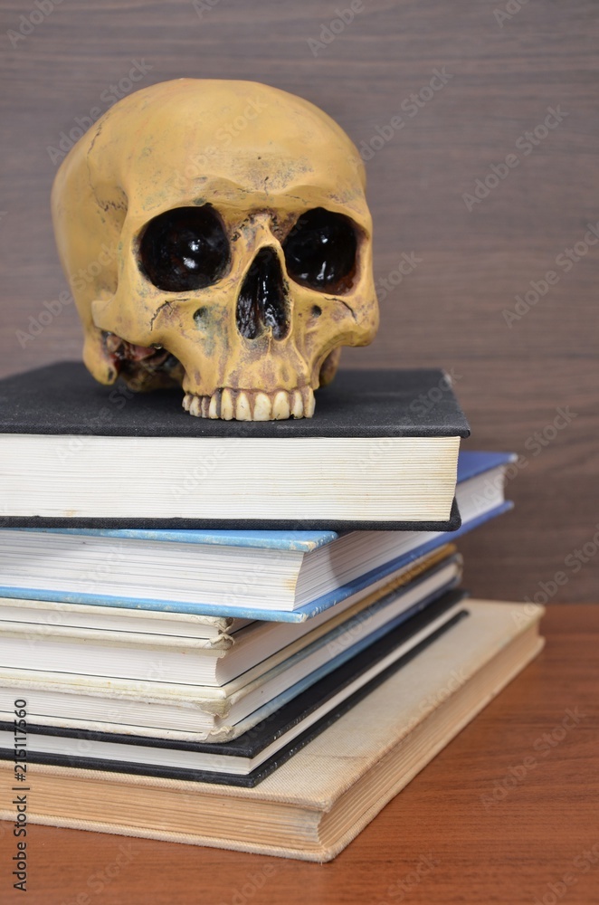 books with human skull books with human skull