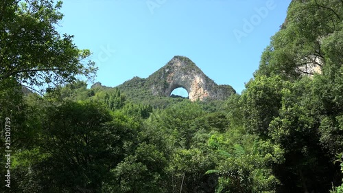 Moon Hill with the natural arch seen from below. Yangshuo, Guilin, Guangxi Zhuang, China photo