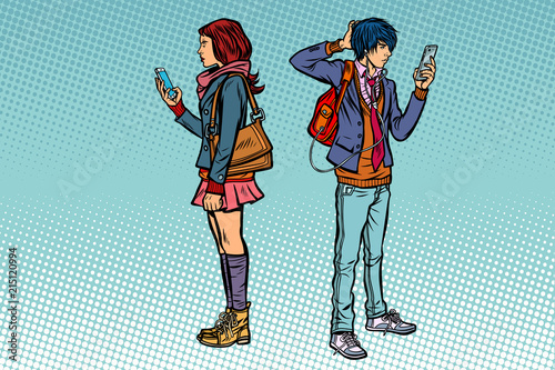 Young man and girl. Teen couple with smartphones
