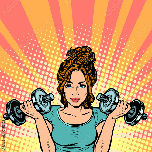 Beautiful woman with dumbbells in gym